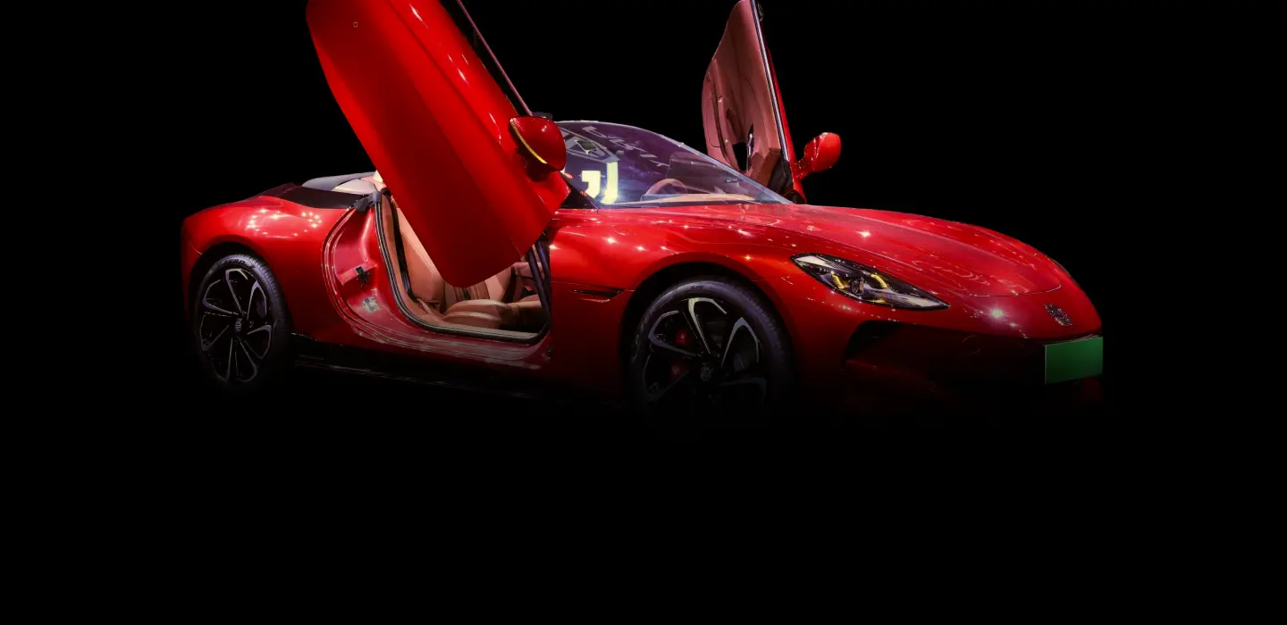 Red sports car with open doors
